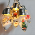 Miniature scene christmas led string decorative lights with clear glass bulbs featuring snow and festive figurines