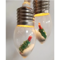 Clear glass christmas led string lights with miniature green trees and red tops in white sand decorative lights