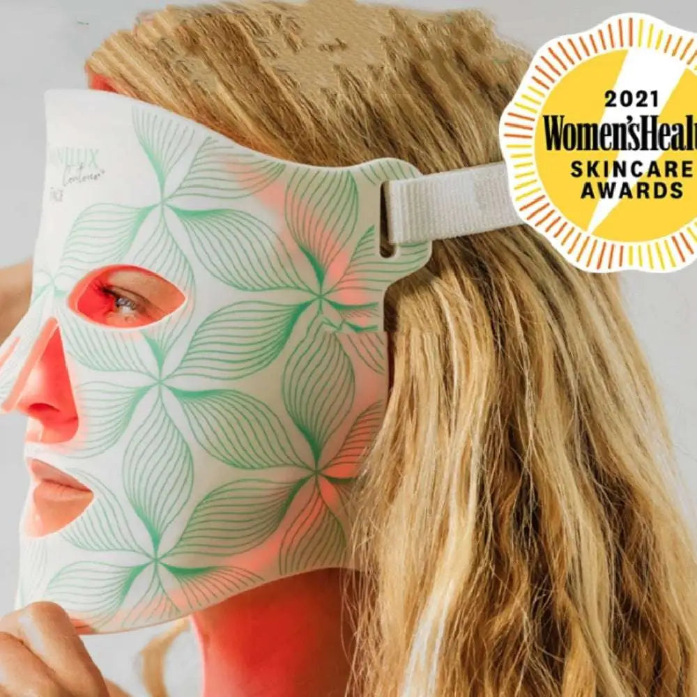 White face mask with green leaf pattern and glowing red light branded as minilux collagen anti aging beauty instrument