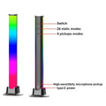 A sleek black cylindrical minimalist rainbow led desktop light tower with vibrant gradient and multiple modes features