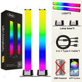 Two sleek minimalist rainbow led desktop lights with vibrant rainbow gradient illumination and modern design