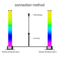 Two minimalist rainbow led desktop lights with vertical rectangular design and black usb interface cables