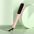 Pink hair care electric straightener comb with black bristles and gold accents for anion hair care styling