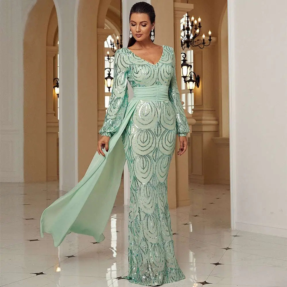 Mint green long sleeve sexy sequined evening dress with shimmering fabric and a flowing train for formal occasions
