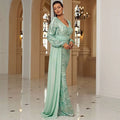 Shimmering mint green long sleeve sexy sequined evening dress with intricate sequin detailing and elegant design