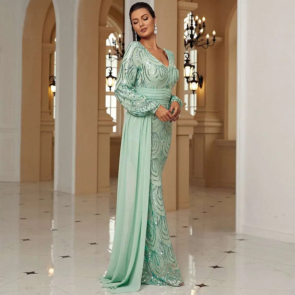 Shimmering mint green long sleeve sexy sequined evening dress with intricate sequin detailing and elegant design
