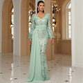 Mint green long sleeve sexy sequined evening dress with fitted bodice, intricate swirls, and flowing side slit