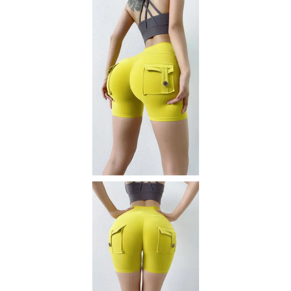 Bright yellow high-waisted athletic shorts with cargo pockets and button closures in celebrity nude feel style