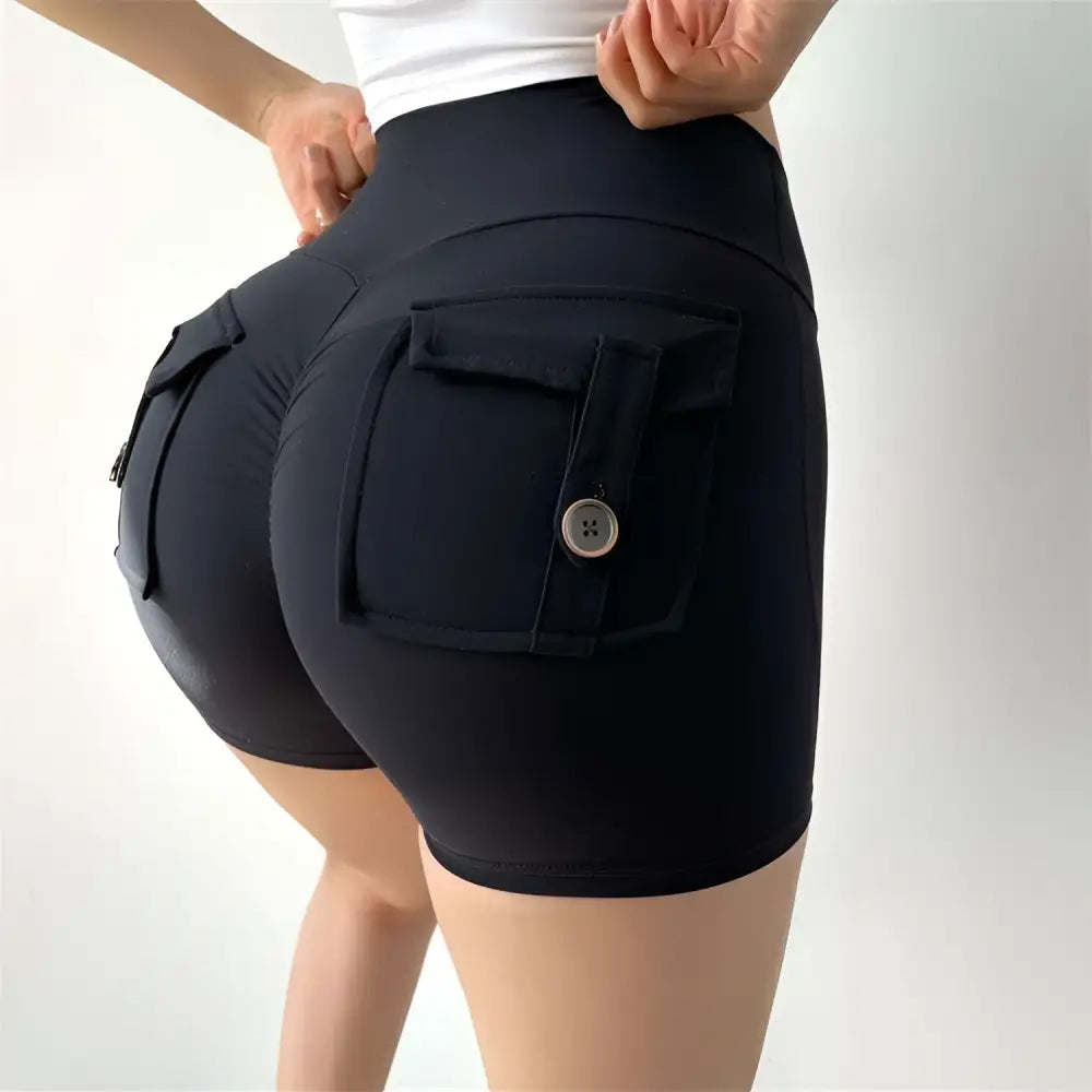 Black high-waisted feel pocket yoga shorts with buttoned cargo pocket on back in mint green nude celebrity nude feel