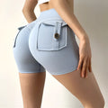 Mint green nude feel pocket yoga shorts in light blue with high waist buttoned flap pocket and side drawstring ties