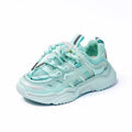 Mint green mesh older children’s casual sports shoes with translucent overlays and silver accents for everyday wear
