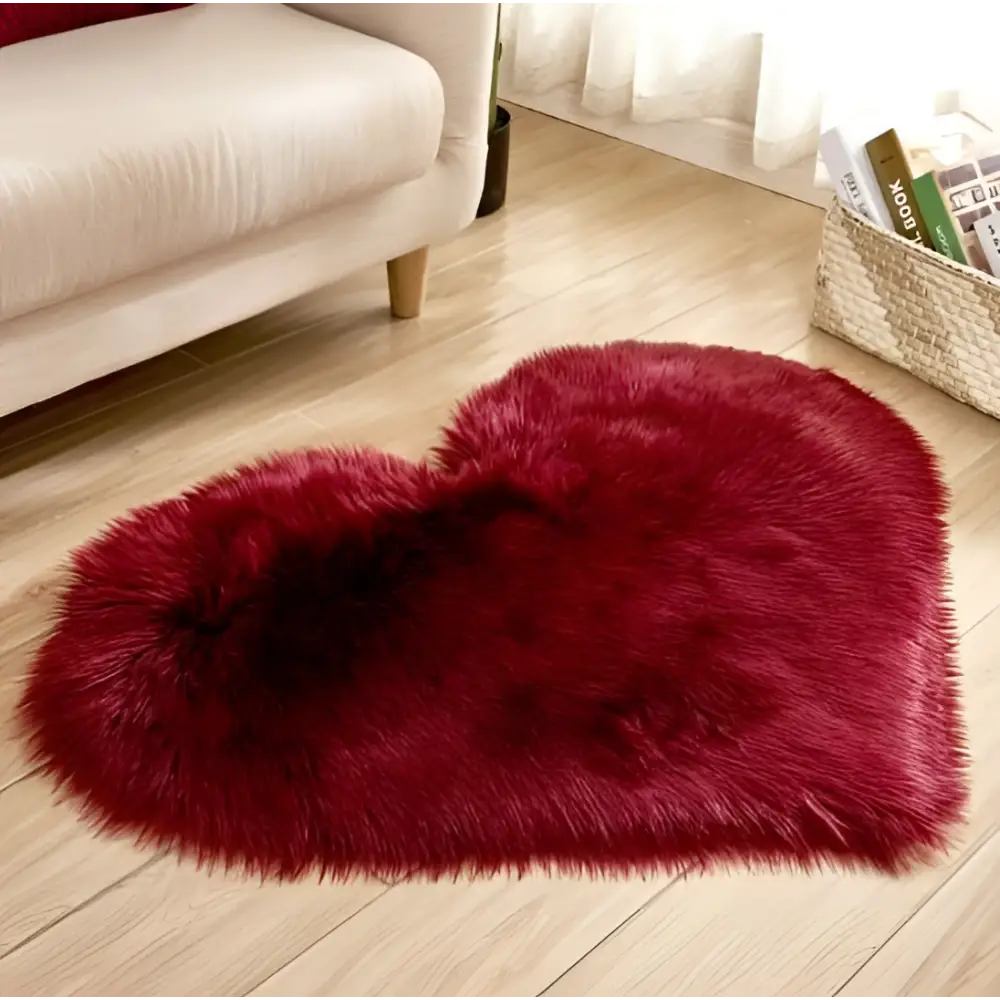 A plush heart shaped living room rug in deep red with a soft fluffy texture contrasting the mint green plush theme