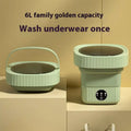 Mint green ribbed folding washing machine with handle and efficient folding design for convenient laundry use