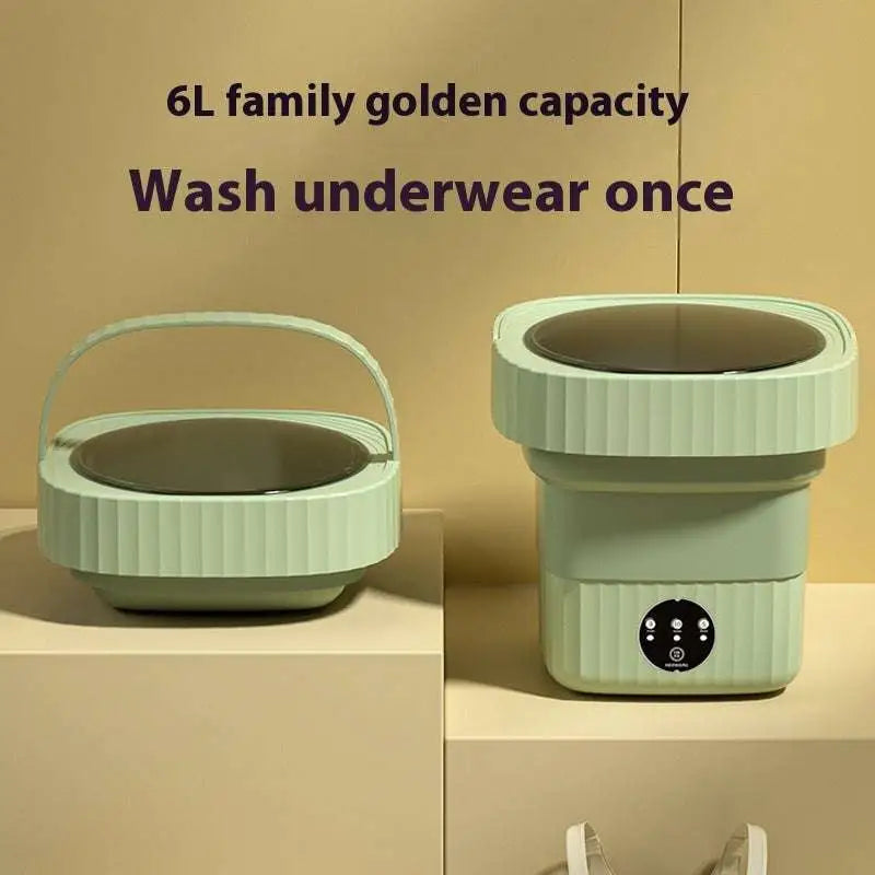 Mint green ribbed folding washing machine with handle and efficient folding design for convenient laundry use