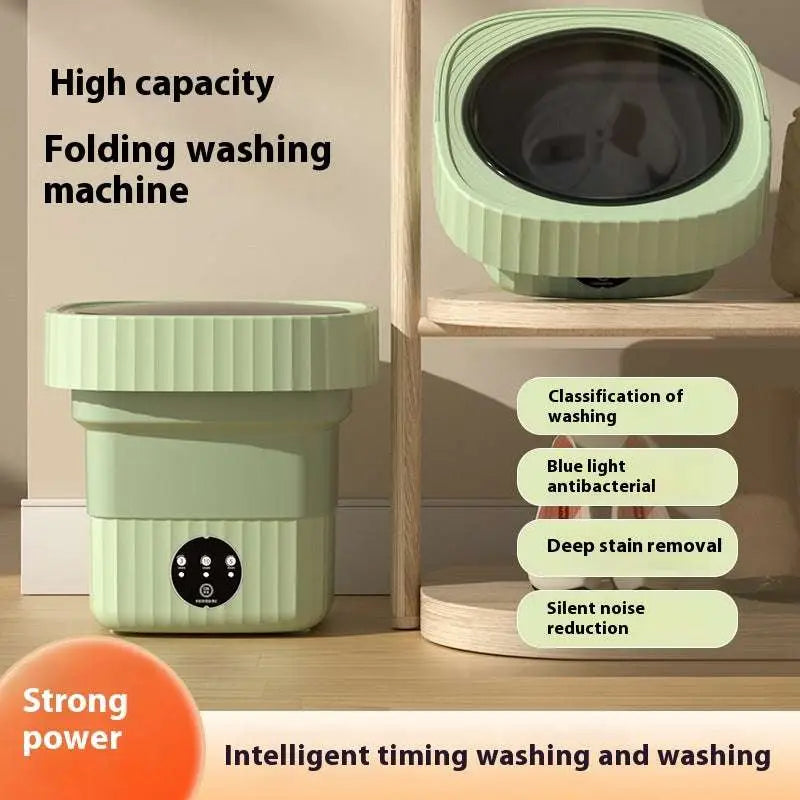 Mint green ribbed folding washing machine with a circular transparent lid and efficient folding washing controls panel