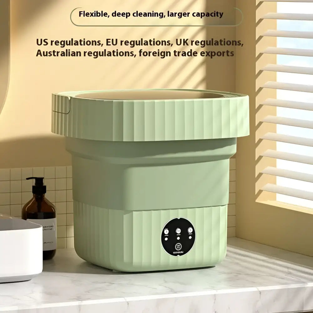 A mint green ribbed folding washing machine with a circular control panel designed for efficient folding washing
