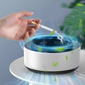 White cylindrical air purification ashtray with blue glowing base and green leaf decals for green smoke removal