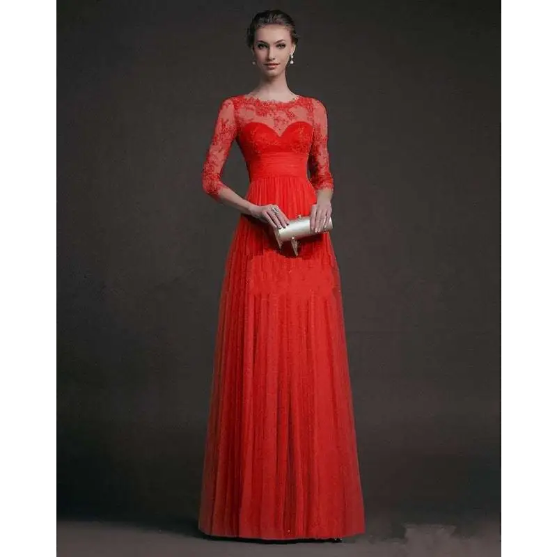 A vibrant red long sleeve lace gown featuring three-quarter sleeves and a flowing pleated lace skirt