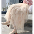Mint green tiered easy matching mesh skirt featuring a flowing peach tulle skirt with mesh stitching and ruffled hemline