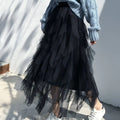 Black tiered tulle skirt with flowing layered design featuring delicate mesh stitching in a mint green tiered style product