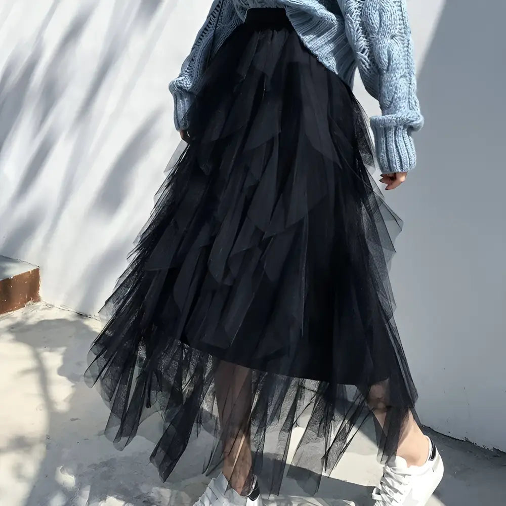 Black tiered tulle skirt with flowing layered design featuring delicate mesh stitching in a mint green tiered style product