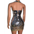 A shimmering form-fitting mini dress with silver and gold mirror shards for nightclub dj female stage performances