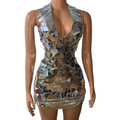 A form-fitting mini dress for nightclub dj female with reflective mirror pieces and rhinestone trim for stage nightclub performances