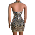 A shimmering form-fitting mini dress with mirrored triangular accents for nightclub dj female stage performances
