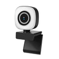 Model 4k live black computer camera with a circular lens surrounded by a decorative ring for high quality streaming