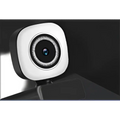 Model 4k live white computer camera with a black circular lens surrounded by a ring of small lights for broadcast use
