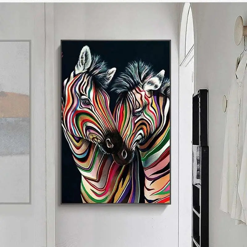 Modern abstract zebra canvas painting with two zebras featuring swirling rainbow stripes on deep black background