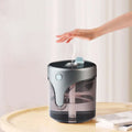 Modern auto alcohol dispenser handsanitizer with a sleek curved cylindrical design in gray and black for touchless hand washing