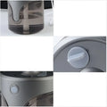 Modern auto alcohol dispenser handsanitizer with gray translucent plastic cylindrical design and circular dial control for touchless hand washing