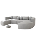 Modern grey modular sectional sofa bed with plush textured fabric and curved-end modules for versatile seating