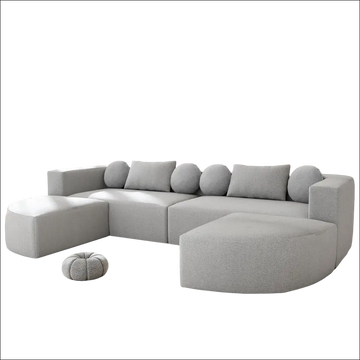 Modern grey modular sectional sofa bed with plush textured fabric and curved-end modules for versatile seating
