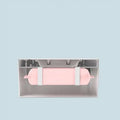Modern household baby wet wipes heater and dispenser with pink silicone wrap and white plastic clips for baby wet wipes