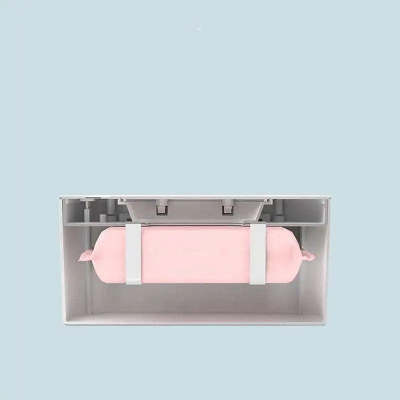 Modern household baby wet wipes heater and dispenser with pink silicone wrap and white plastic clips for baby wet wipes