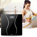 Modern household electronic scale with black glass surface and white curved accents from scale wholesale manufacturer