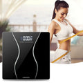 Modern household electronic scale with black glass surface and white curved accents from scale wholesale manufacturer