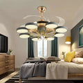 Modern Nordic stealth ceiling fan with integrated LED lights, brass-finished hub, and eight gray lamp shades in radial design