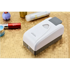 Modern wall mounted foam soap dispenser in white and gray plastic with sleek modern design for efficient use