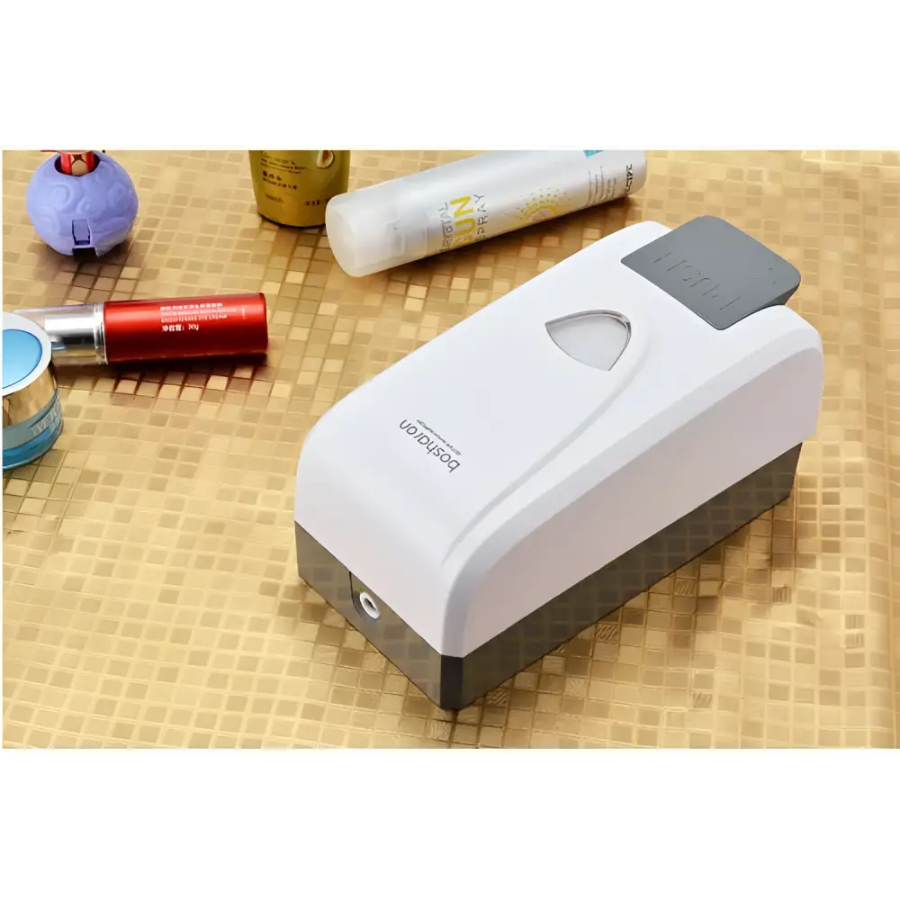 Modern wall mounted foam soap dispenser in white and gray plastic with sleek modern design for efficient use