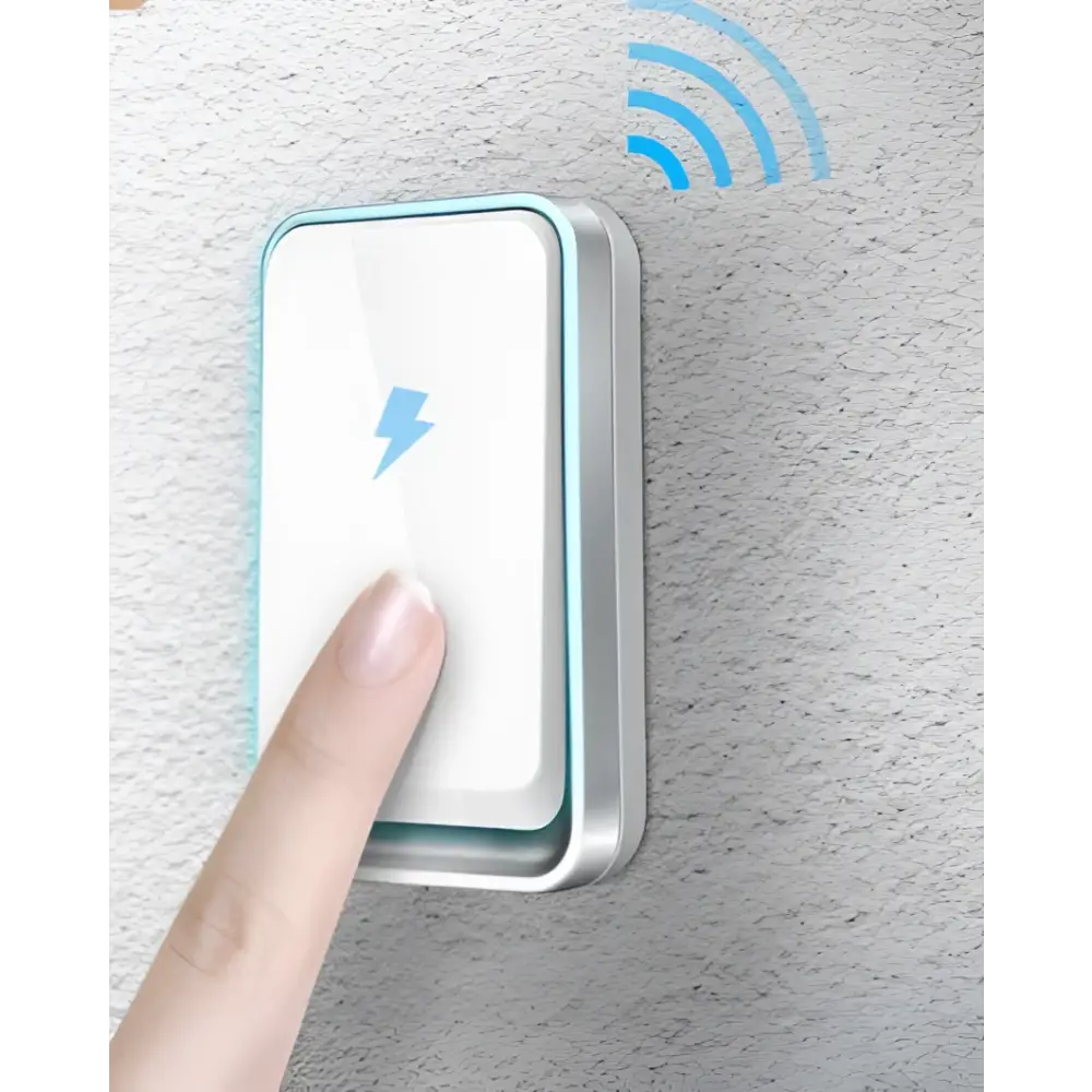 A modern white and silver wireless door bell with a sleek wireless charging pad featuring a blue lightning bolt emblem