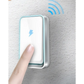 A modern white and silver wireless door bell with a sleek wireless charging pad featuring a blue lightning bolt emblem