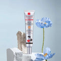 Silver tube of moisturizing correcting cc cream with centella asiatica and floral design for natural radiance on dark skin tone