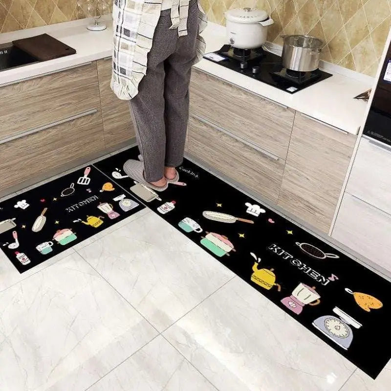 Black kitchen mat with colorful cartoon cooking utensils designed for mosaic tile kitchen floors, environmentally friendly