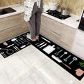Black mosaic tile kitchen floor mat with white and pink cooking utensil illustrations, environmentally friendly design