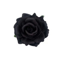 A plush black rose flocking cloth headdress hairpin with soft layered petals and subtle green stem accents