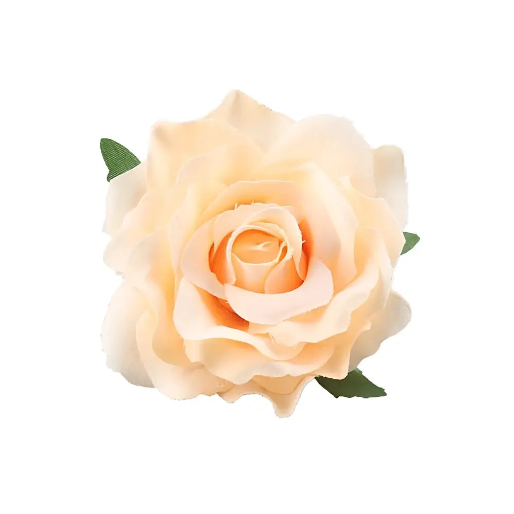 A delicate peach-colored artificial rose with soft petals and green leaves on a multicolor red roses flocking cloth headdress hairpin