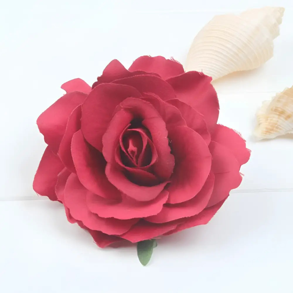 A vibrant red multicolor red roses flocking cloth headdress hairpin with layered petals and a small green stem